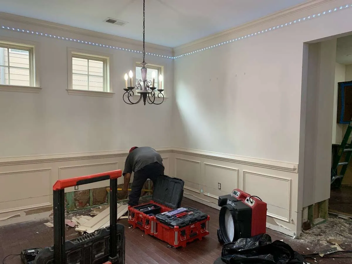 Restoration technician with professional equipment in Richmond